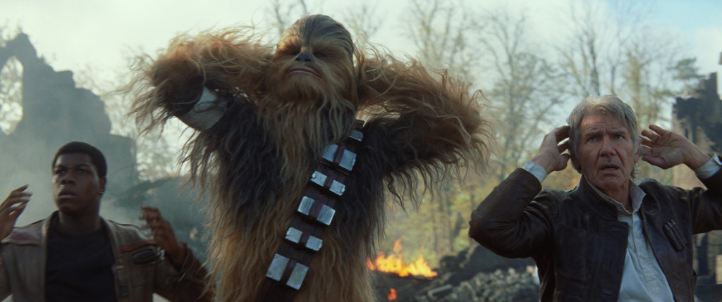 Star Wars: The Force Awakens..L to R: Finn (John Boyega), Chewbacca (Peter Mayhew), and Han Solo (Harrison Ford)..Ph: Film Frame..? 2014 Lucasfilm Ltd. & TM. All Right Reserved..