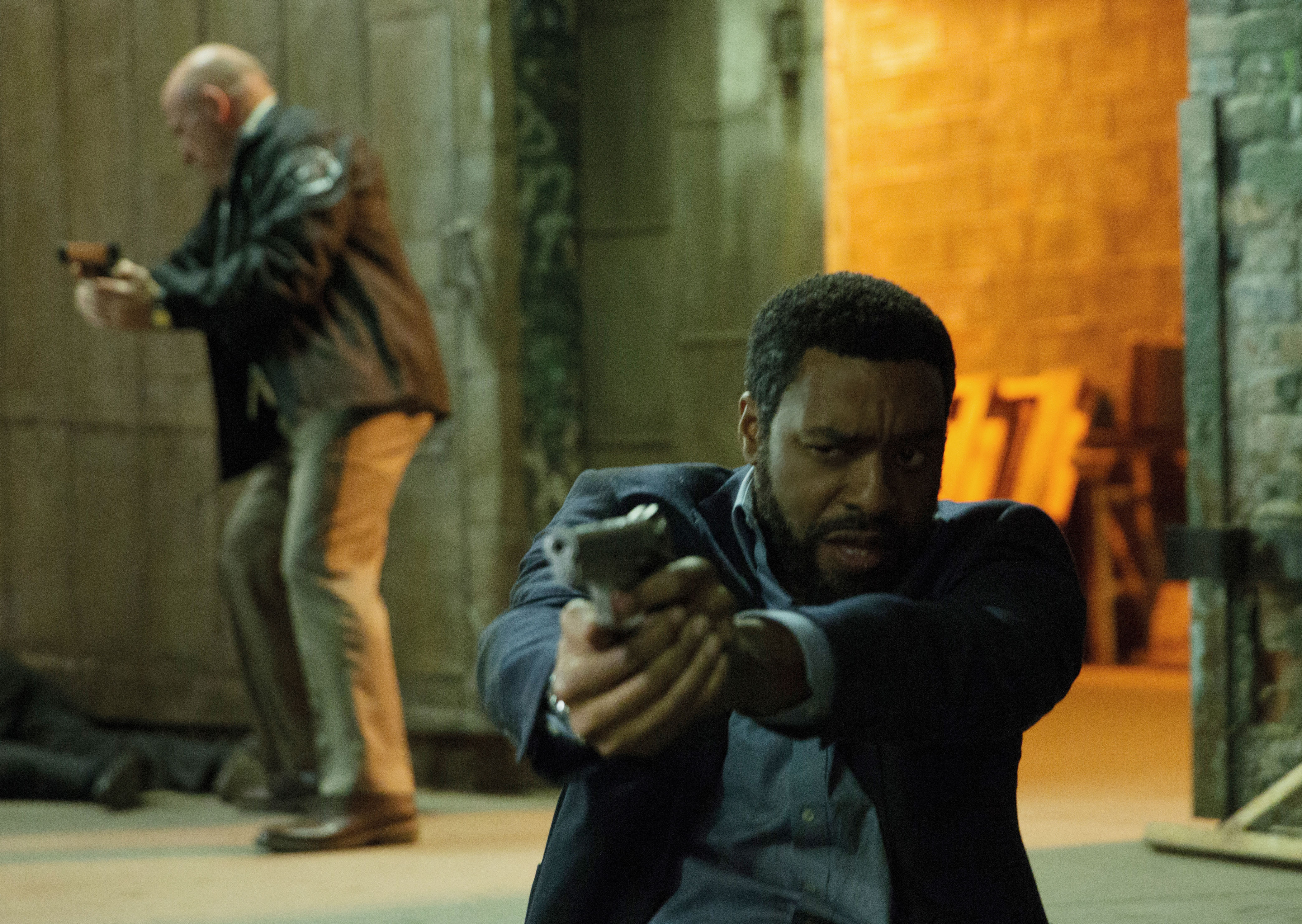 (L-R) DEAN NORRIS and CHIWETEL EJIOFOR star in SECRET IN THEIR EYES.